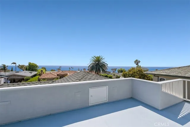 a terrace with a table and chairs