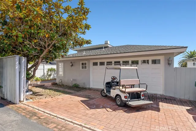 a view of a car parked in front of a house