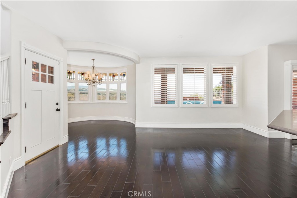 1608 Smiley Ridge Redlands, CA 92373 - Photo 36 of 84 a view of empty room with wooden floor and fan