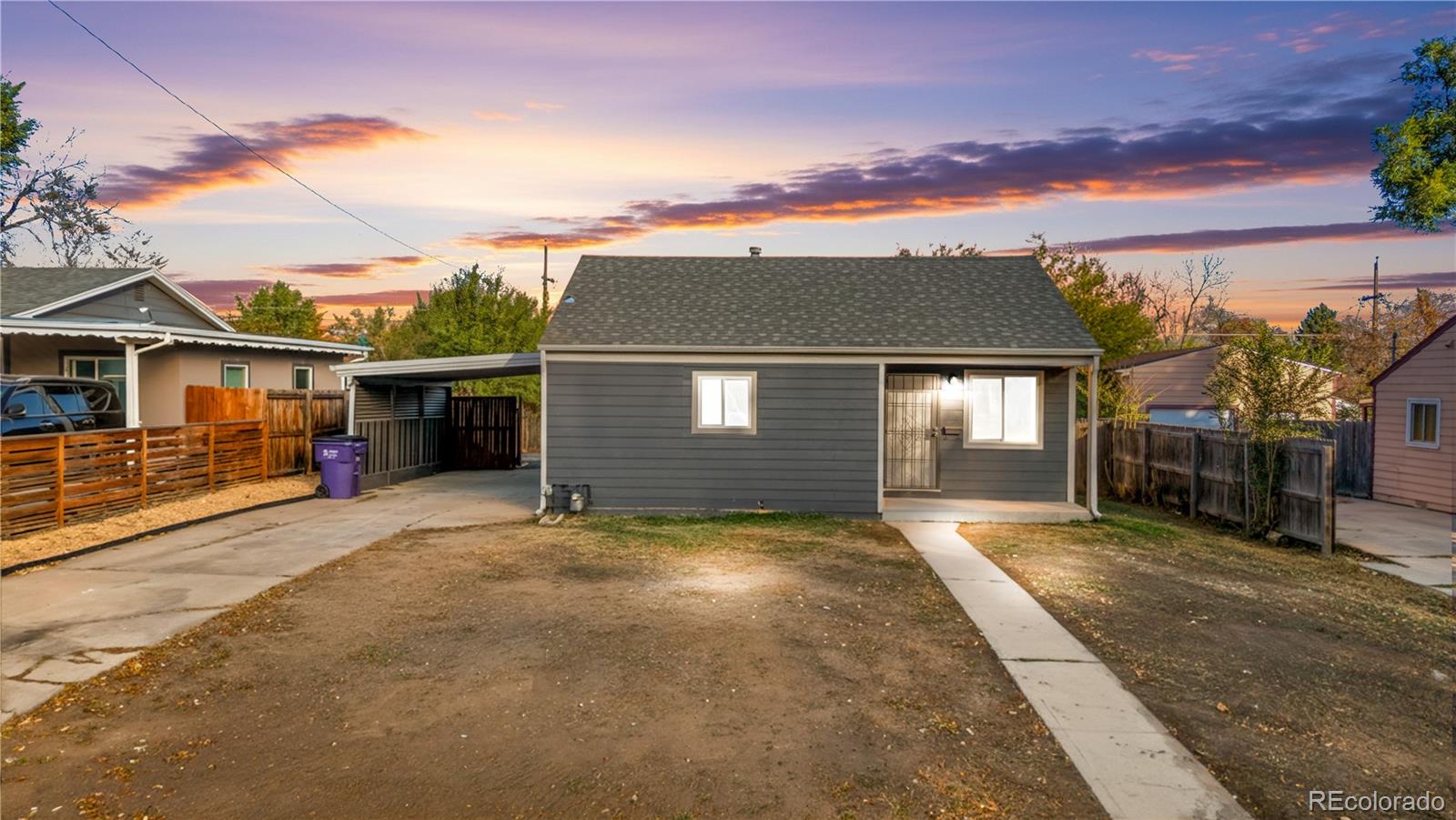 1550 South Xavier Street Denver, CO 80219 - Photo 24 of 46 a view of a house with a yard