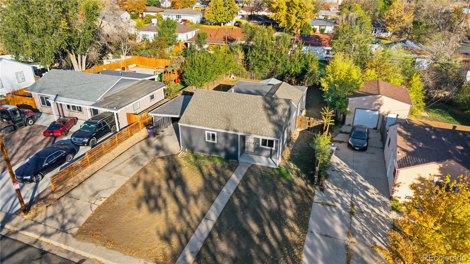 1550 South Xavier Street Denver, CO 80219 - Photo 26 of 46 an aerial view of residential houses with outdoor space