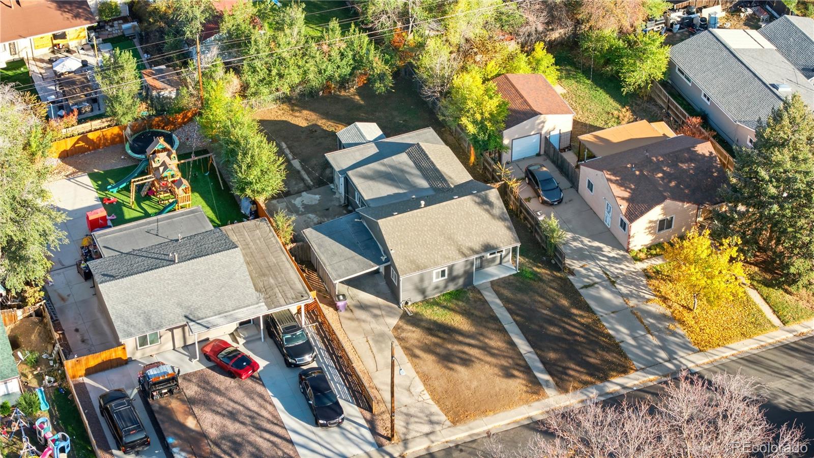 1550 South Xavier Street Denver, CO 80219 - Photo 36 of 46 an aerial view of a house with a garden