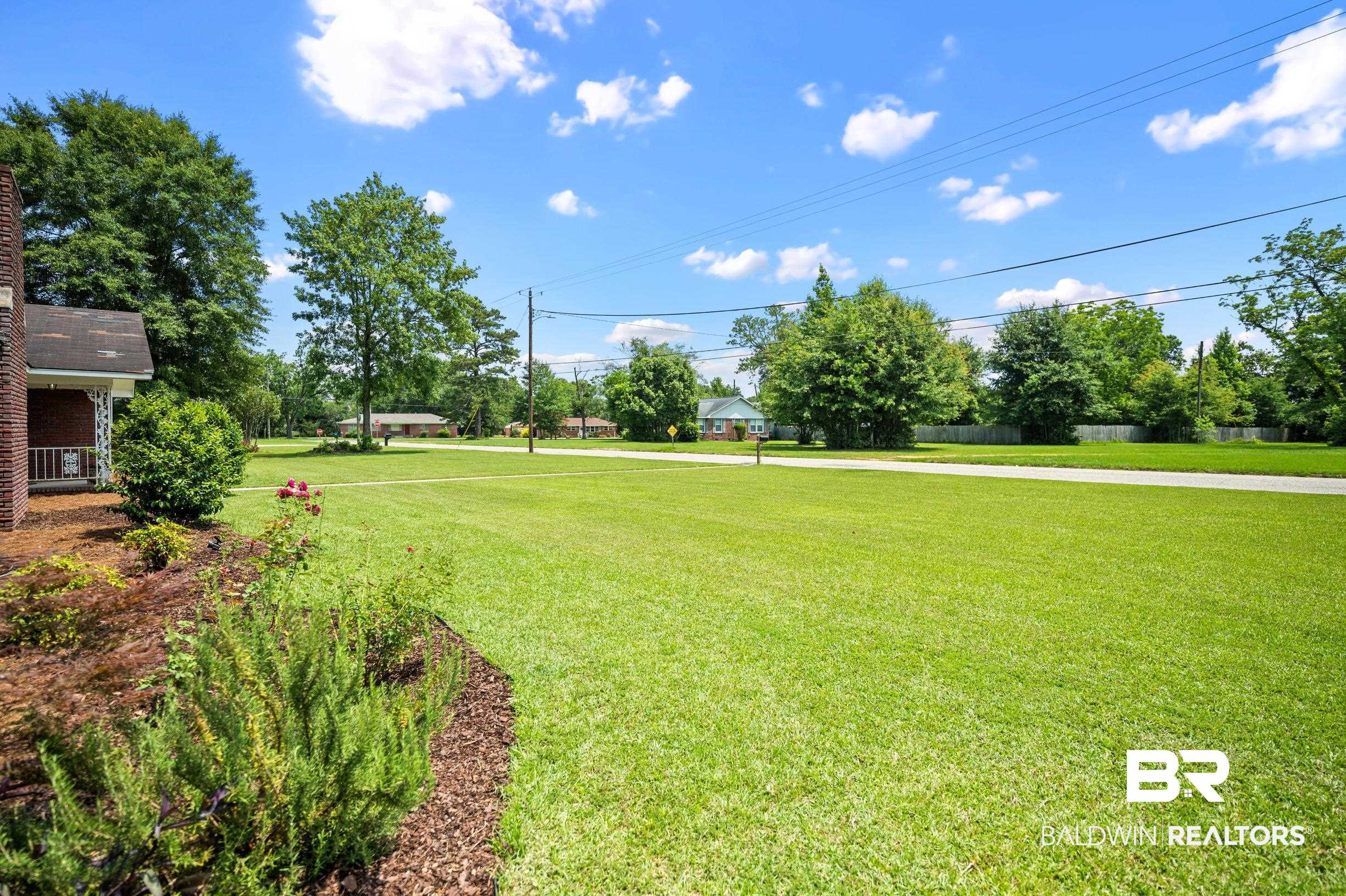 56 Old Bratt Road Atmore, AL 36502 - Photo 34 of 37 View of green lawn