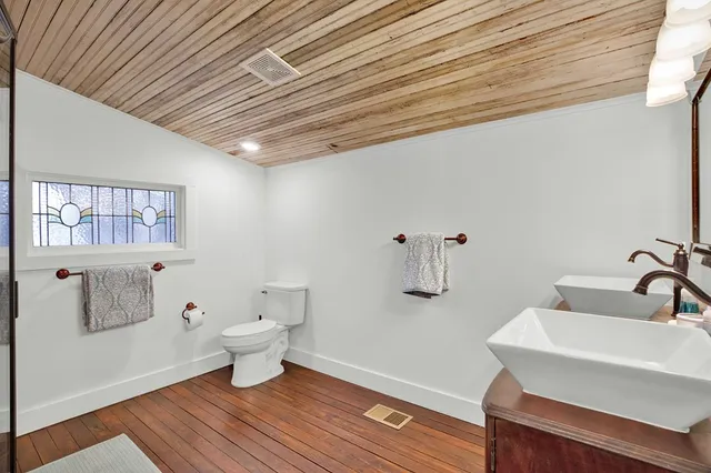 a bathroom with a sink and a toilet