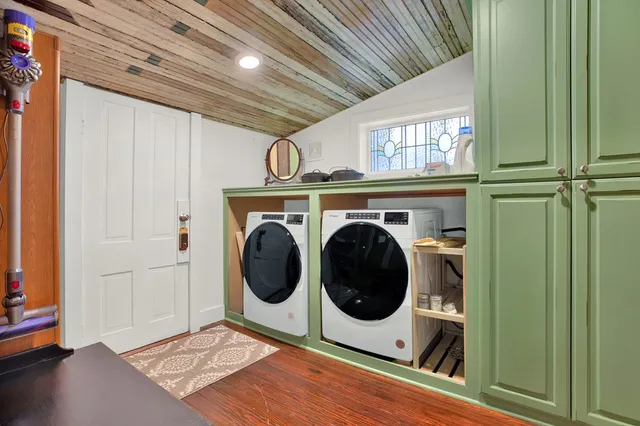 a utility room with dryer and washer