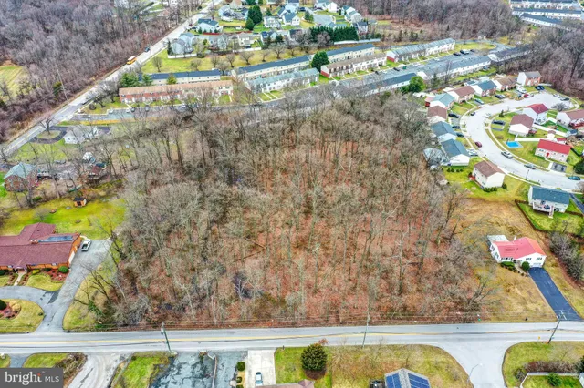 a view of swimming pool with a yard