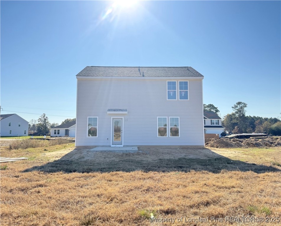 208 Buggy Top Lane Autryville, NC 28318 - Photo 2 of 13 a view of a house with a yard