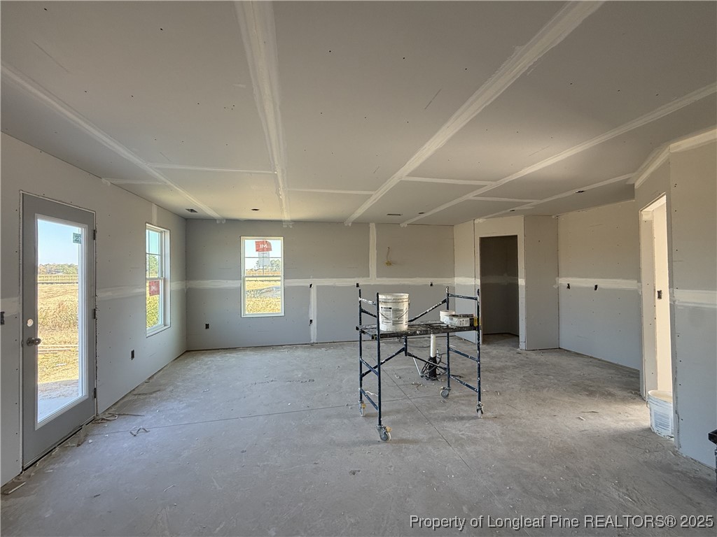 208 Buggy Top Lane Autryville, NC 28318 - Photo 6 of 13 a view of a livingroom with furniture and window