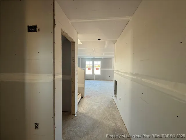 a view of hallway with stairs