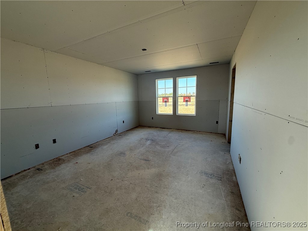 208 Buggy Top Lane Autryville, NC 28318 - Photo 8 of 13 a view of an empty room with a window