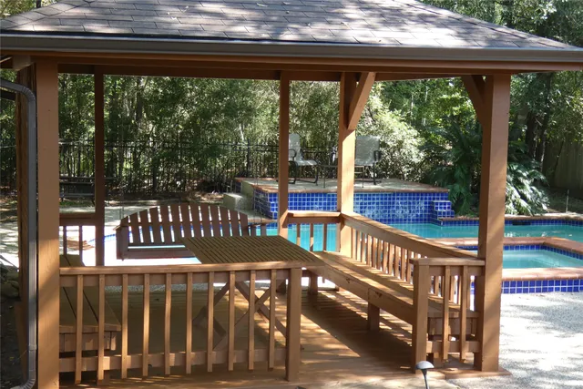 a view of an outdoor space with a swimming pool
