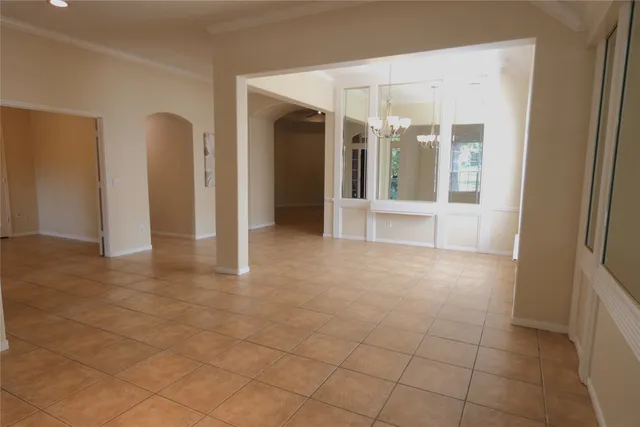 a view of an empty room with a fireplace