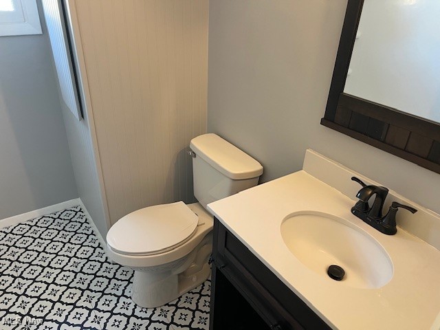 2276 Raber Road, Unit C Uniontown, OH 44685 - Photo 7 of 13 Half bath with vanity and toilet