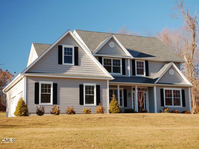 136 Rockwell Road Bethel, CT 06801 - Photo 1 of 1 a front view of a house with a yard