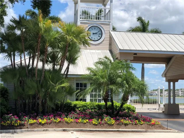 a view of a livingroom with furniture and a window