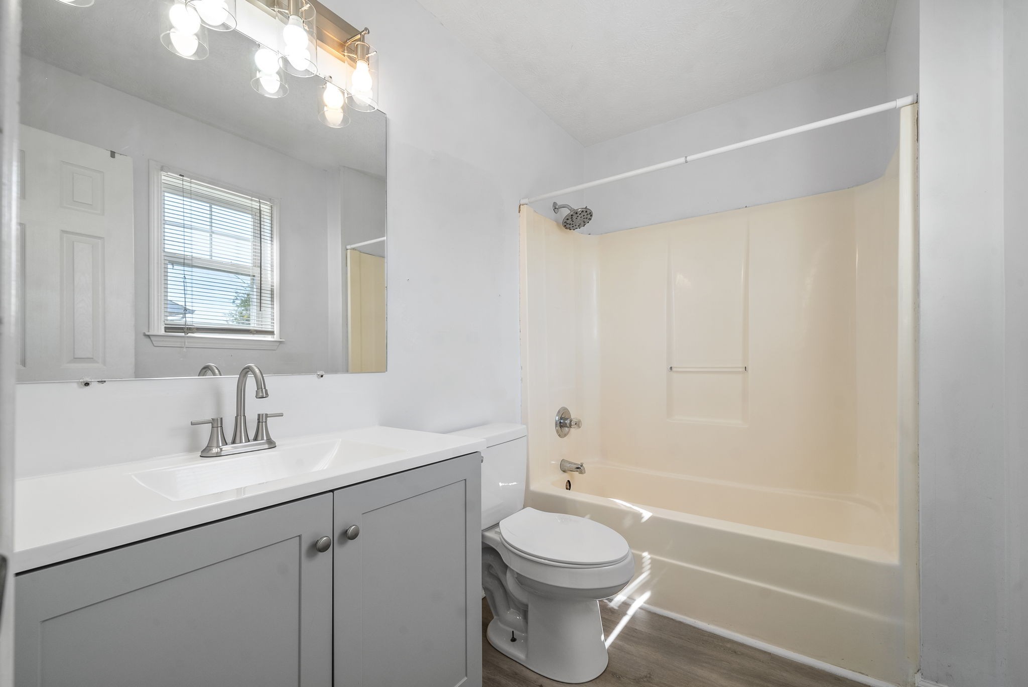 100 Karen Court Oak Grove, KY 42262 - Photo 7 of 11 a bathroom with a sink a toilet and shower