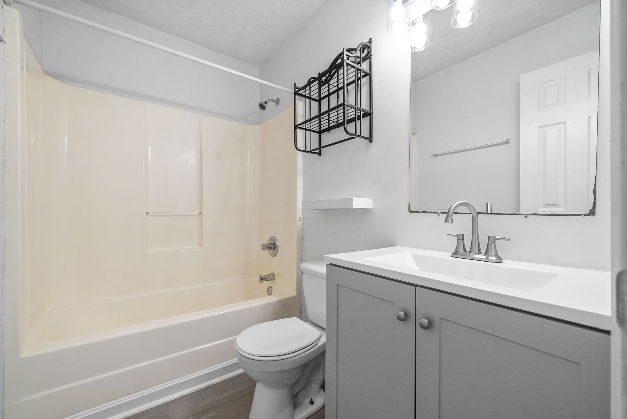 100 Karen Court Oak Grove, KY 42262 - Photo 9 of 11 a bathroom with a sink a toilet and shower