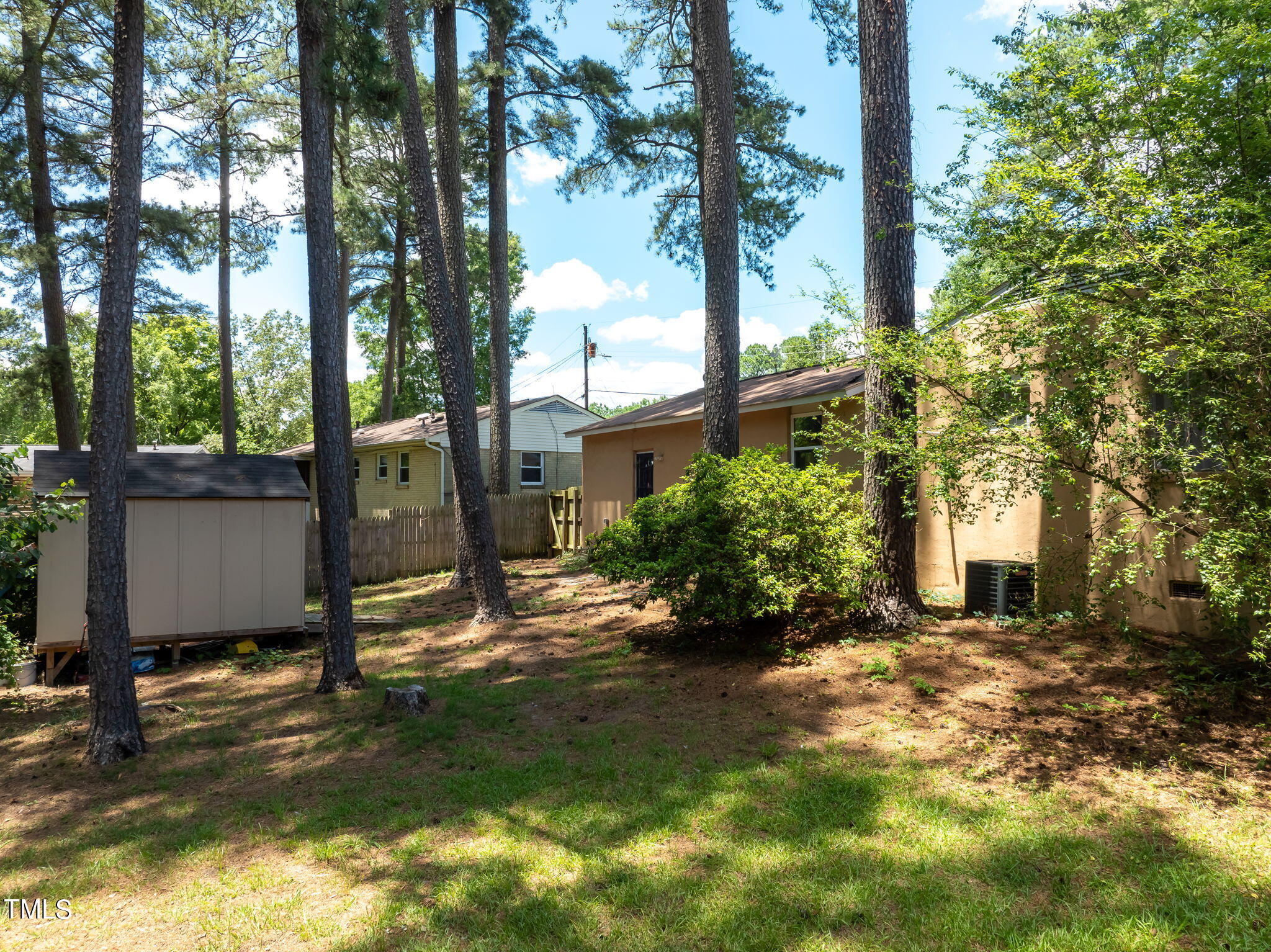 1708 Tee Dee Street Raleigh, NC 27610 - Photo 3 of 16 a view of a house with a yard