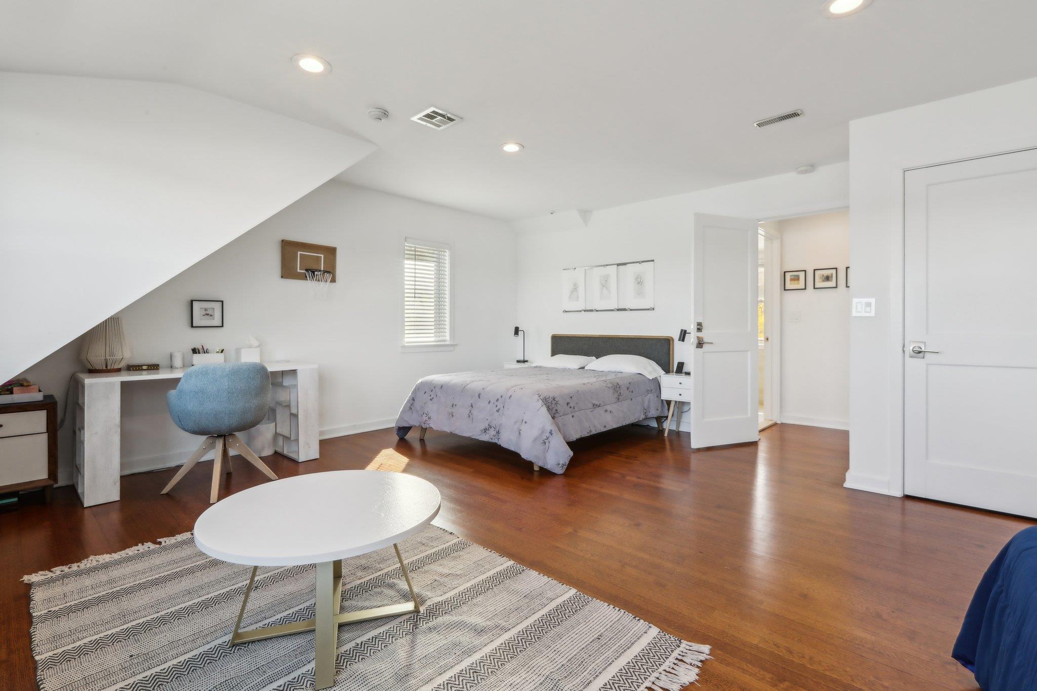 2 Washington Avenue Nyack, NY 10960 - Photo 19 of 50 a bedroom with furniture and a wooden floor