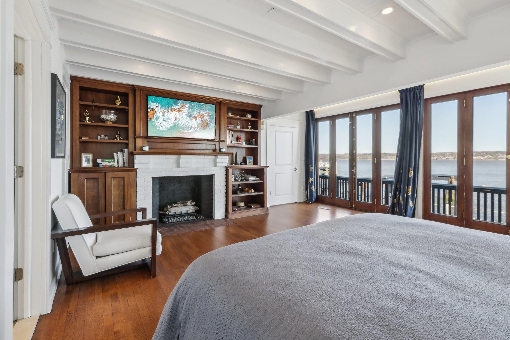 2 Washington Avenue Nyack, NY 10960 - Photo 24 of 50 a bedroom with furniture and a fireplace