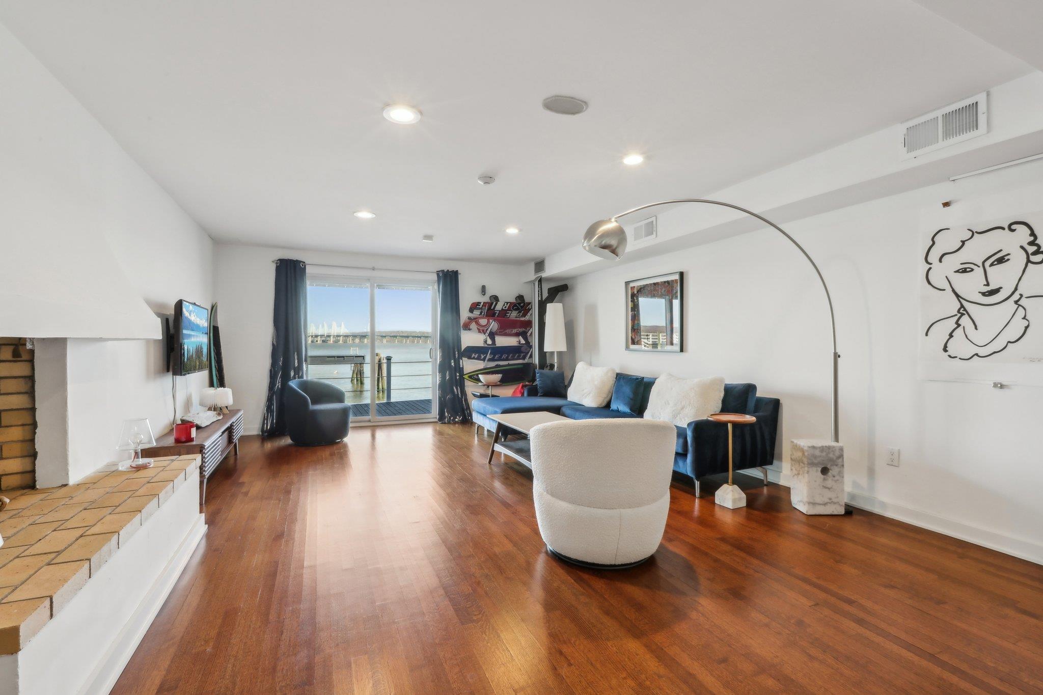 2 Washington Avenue Nyack, NY 10960 - Photo 32 of 50 a living room with furniture and wooden floor