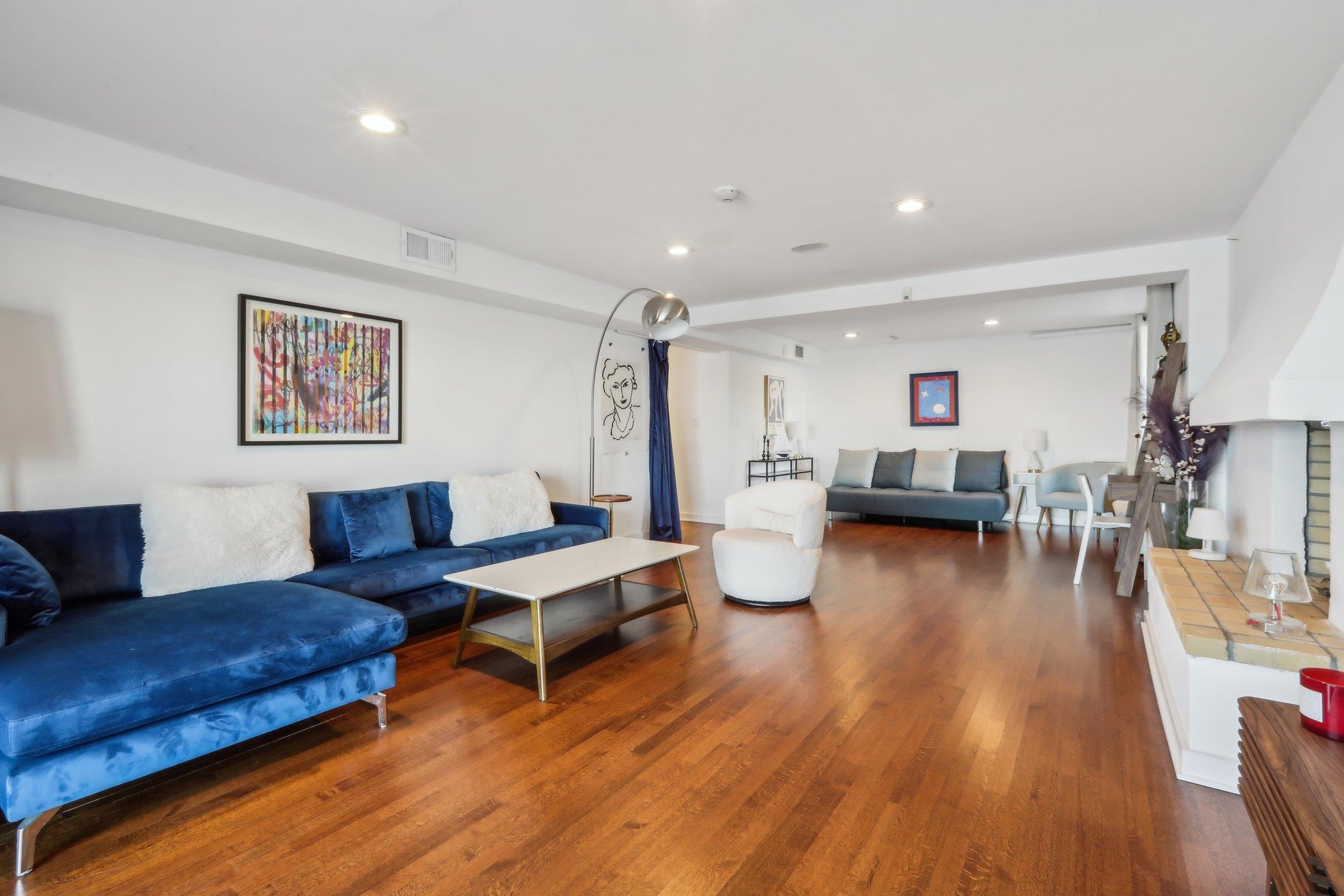 2 Washington Avenue Nyack, NY 10960 - Photo 33 of 50 a living room with furniture and a wooden floor