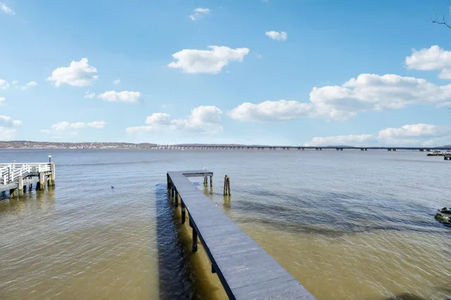 a view of wooden floor and lake