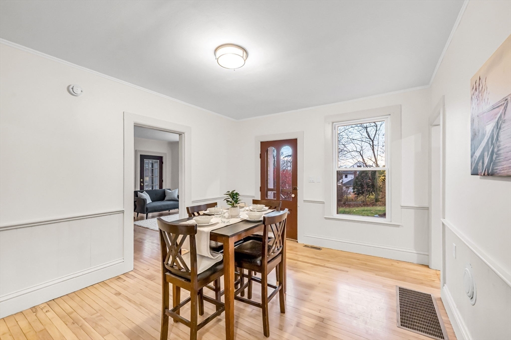 48 Gray Street Amherst, MA 01002 - Photo 11 of 42 a view of a dining room with furniture and wooden floor