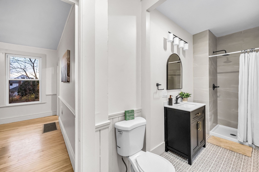 48 Gray Street Amherst, MA 01002 - Photo 12 of 42 a bathroom with a sink toilet and shower