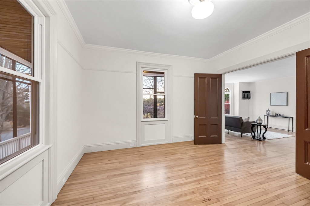 48 Gray Street Amherst, MA 01002 - Photo 14 of 42 a view of empty room with wooden floor and furniture