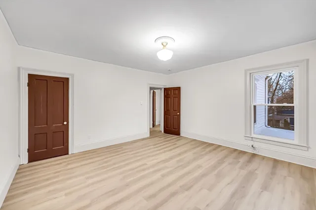 a view of a hallway with closet