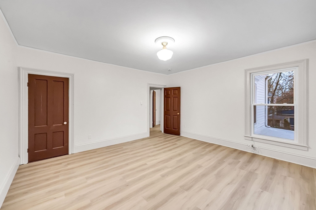 48 Gray Street Amherst, MA 01002 - Photo 24 of 42 a view of an empty room with a window