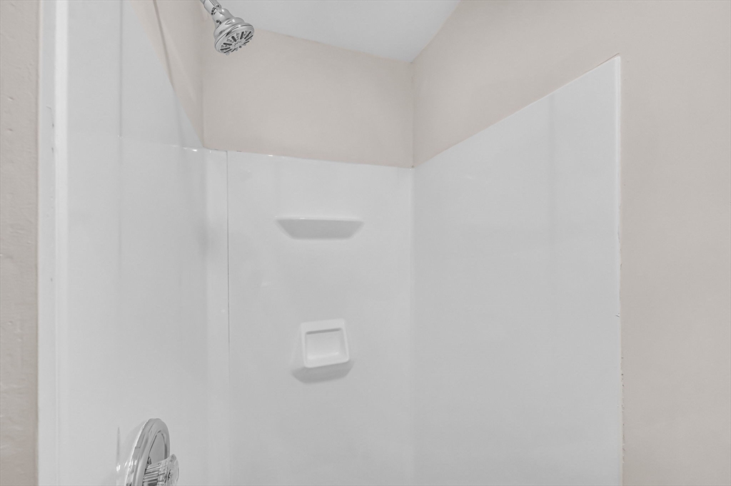 48 Gray Street Amherst, MA 01002 - Photo 30 of 42 a close view of a shower in a bathroom