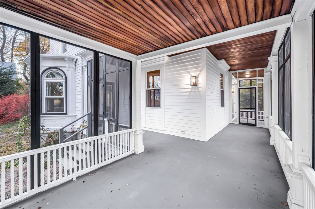 48 Gray Street Amherst, MA 01002 - Photo 3 of 42 a view of a house with porch and wooden floor