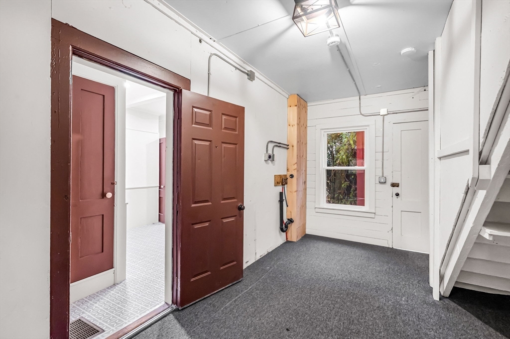 48 Gray Street Amherst, MA 01002 - Photo 32 of 42 an empty room with windows and entryway