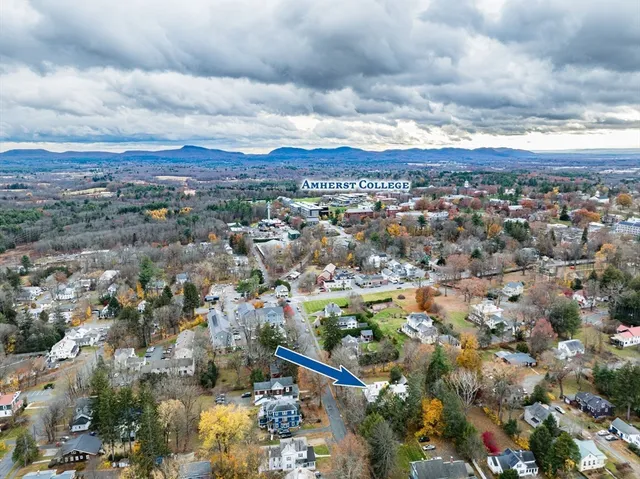 a view of city and swimming pool