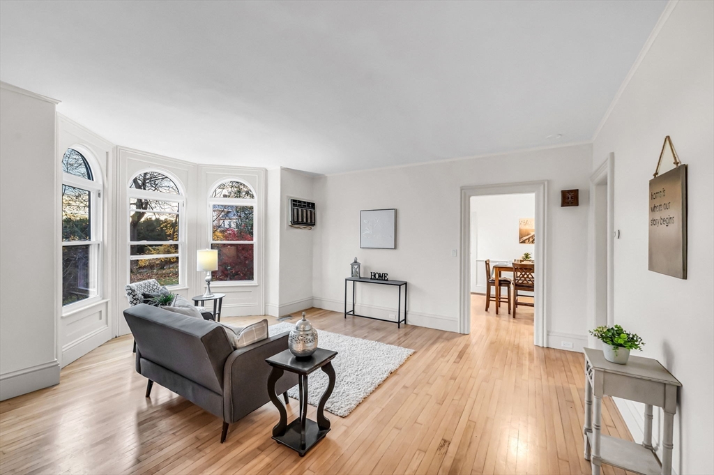 48 Gray Street Amherst, MA 01002 - Photo 9 of 42 a living room with furniture and wooden floor