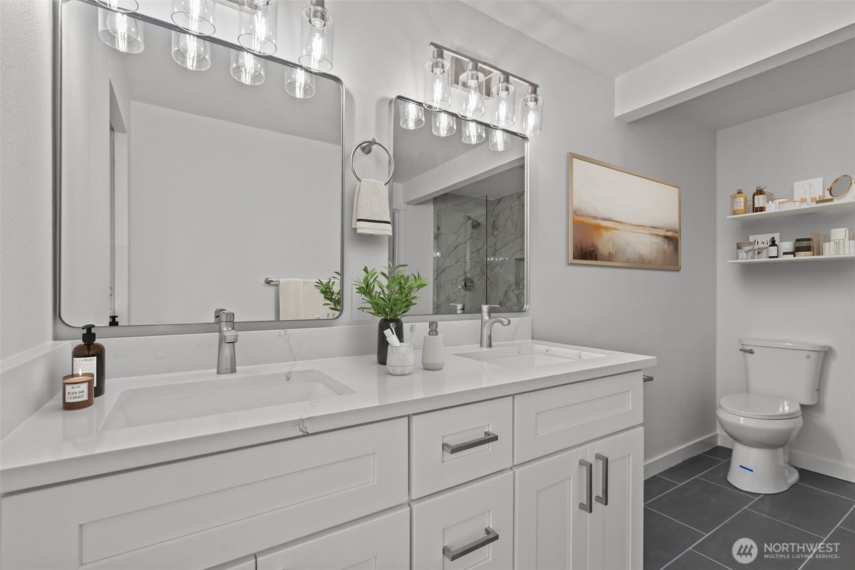 21316 188th Avenue Southeast Renton, WA 98058 - Photo 13 of 40 a bathroom with a sink a toilet and shower