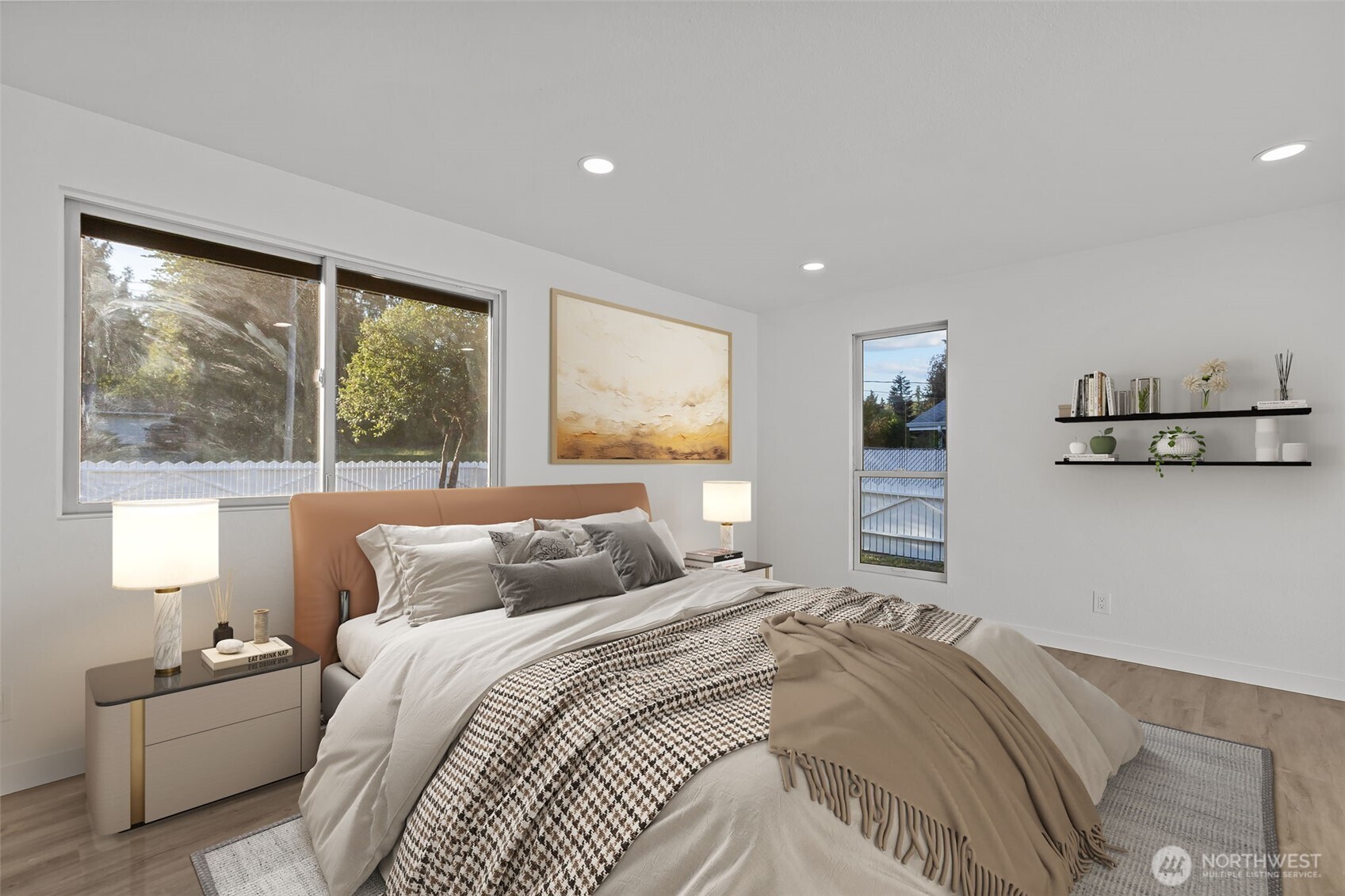 21316 188th Avenue Southeast Renton, WA 98058 - Photo 14 of 40 a bedroom with a large bed and a window