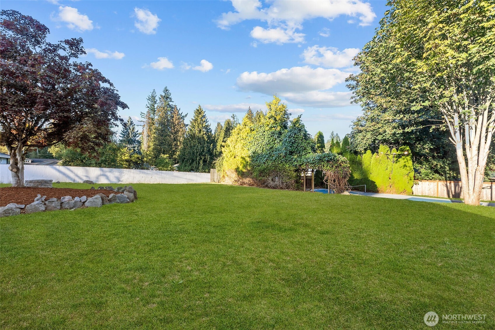 21316 188th Avenue Southeast Renton, WA 98058 - Photo 26 of 40 a view of yard with green space and garden