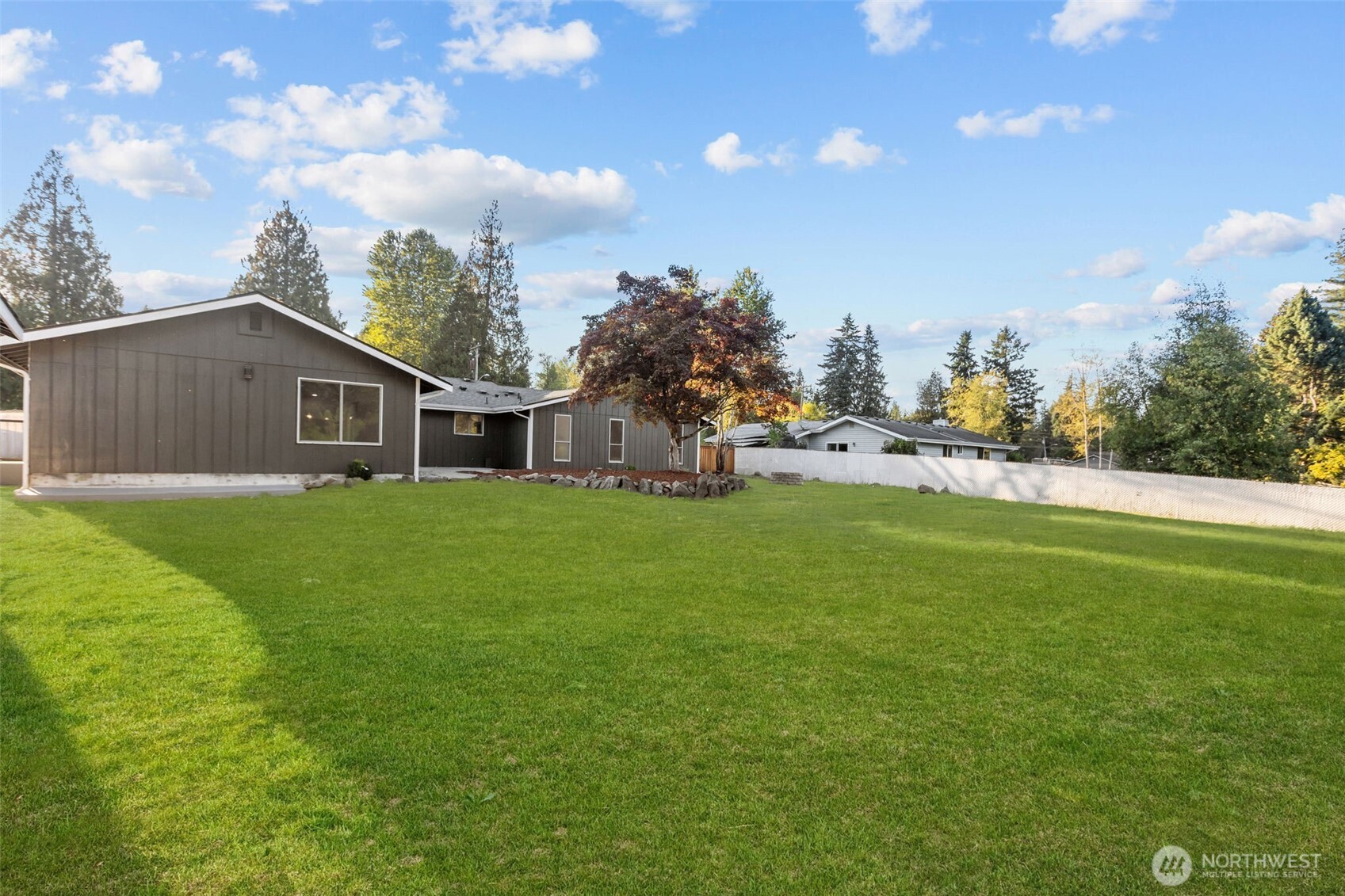21316 188th Avenue Southeast Renton, WA 98058 - Photo 27 of 40 a view of house with a big yard