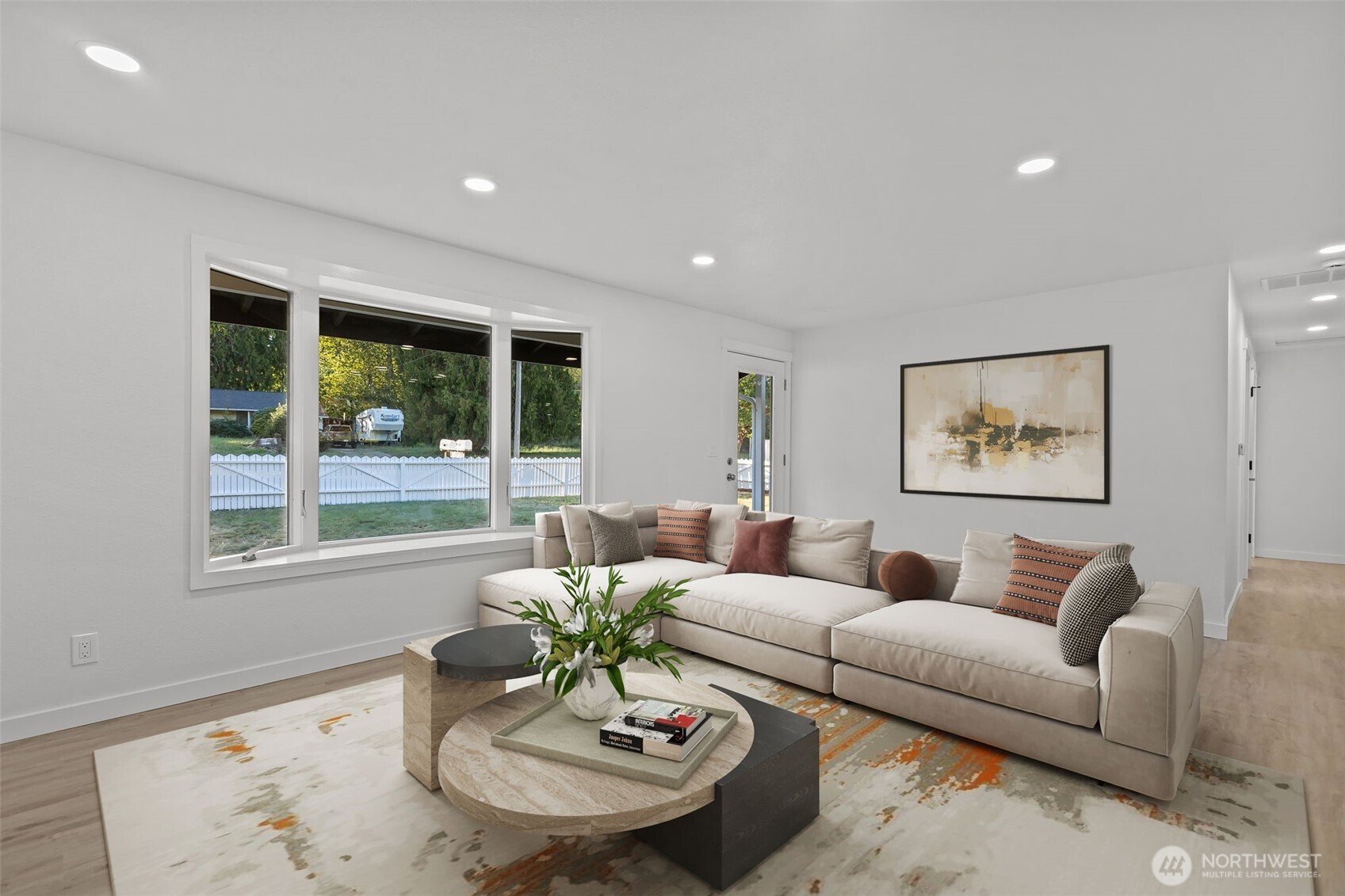 21316 188th Avenue Southeast Renton, WA 98058 - Photo 3 of 40 a living room with furniture potted plant and a window