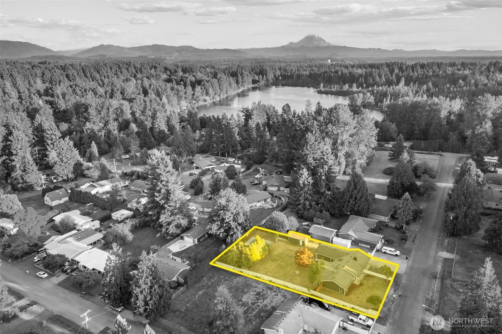 21316 188th Avenue Southeast Renton, WA 98058 - Photo 33 of 40 an aerial view of a residential houses with a yard and lake view