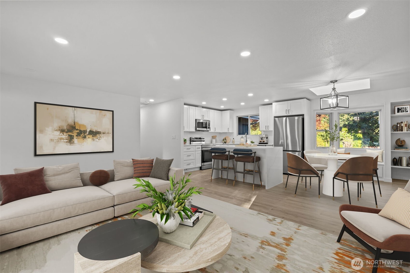 21316 188th Avenue Southeast Renton, WA 98058 - Photo 4 of 40 a living room with furniture kitchen view and a dining table
