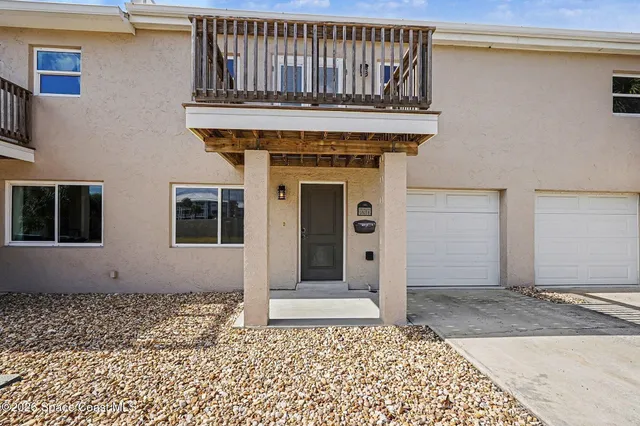 a front view of a house with a shower