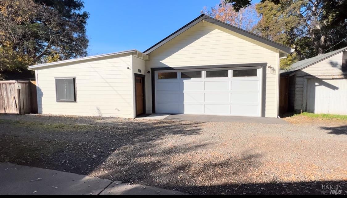 1016-1018 Spring Street Santa Rosa, CA 95404 - Photo 93 of 93 Garage access from Alley. ADU door pictured as well.