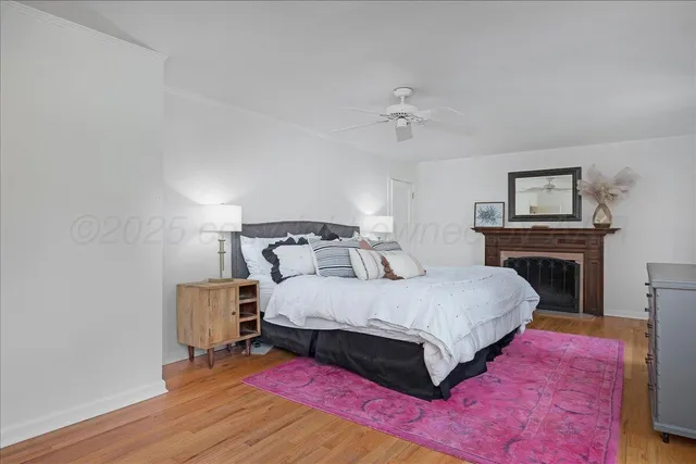 a large white kitchen with a sink and cabinets