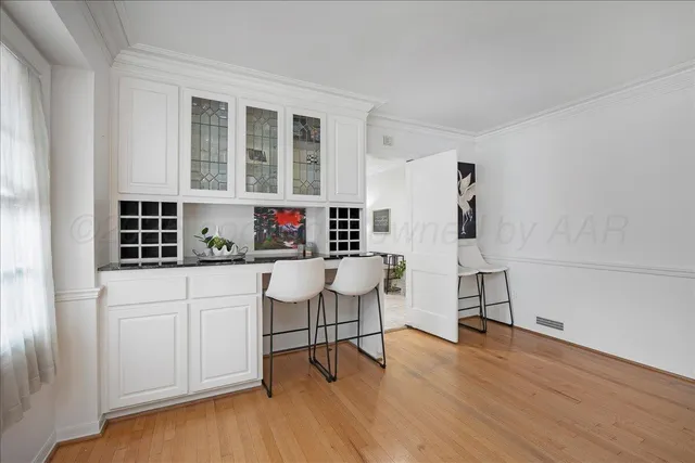 a view of entryway with wooden floor