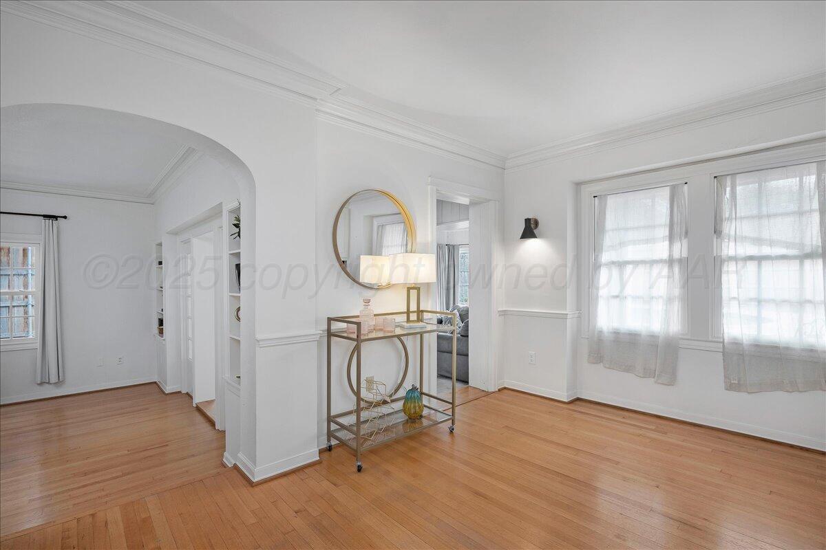 2819 South Hayden Street Amarillo, TX 79109 - Photo 27 of 56 a view of a livingroom with wooden furniture and windows