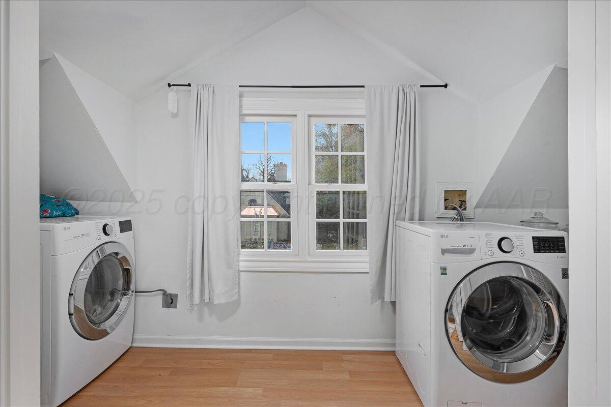 2819 South Hayden Street Amarillo, TX 79109 - Photo 34 of 56 a utility room with dryer and washer